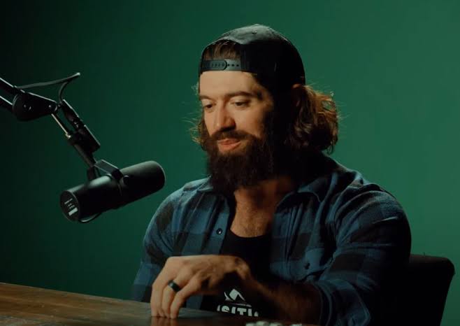 Alex Hormozi on the mic for a podcast